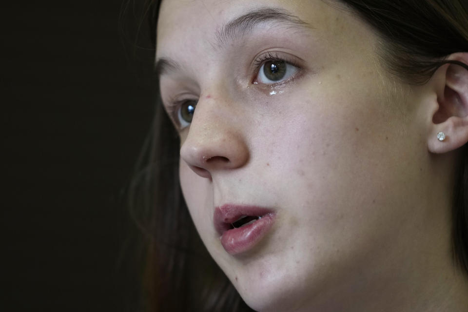 Gabrielle Jameson, a victim of a sexual assault, sheds a tear as she speaks while recounting her struggle, at the office of her attorney Tony Le Mon, in Covington, La., Tuesday, June 6, 2023. (AP Photo/Gerald Herbert)