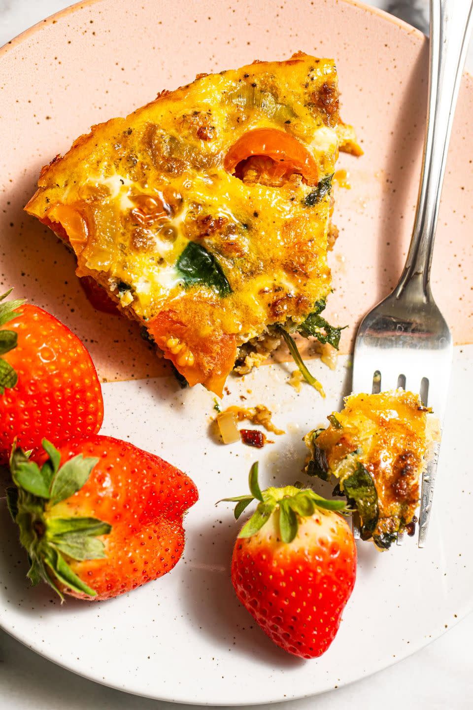 breakfast in bed slice of kitchen sink frittata with strawberries