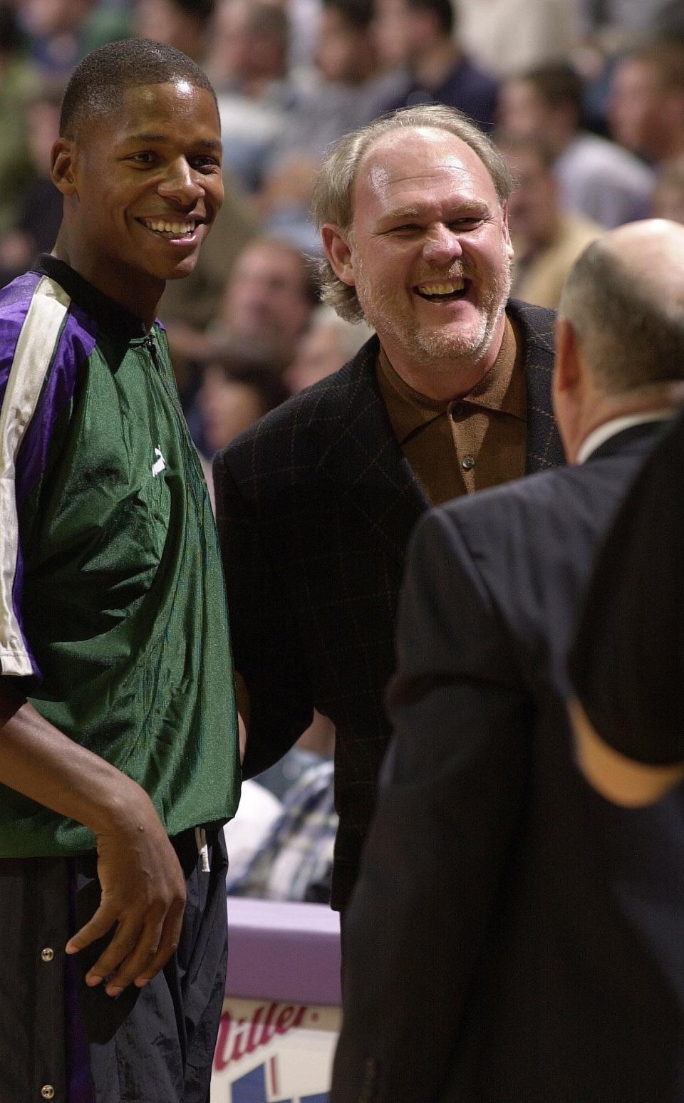 Milwaukee Bucks Ray Allen and coach George Karl share a laugh before the start of a game in October 2000 at the Bradley Center. The two were key components in the Bucks' run to the Eastern Conference finals. But both were both gone two seasons later.