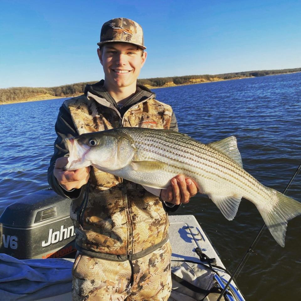 Beau Bronniman of Durant holds a large striped bass caught on Christmas Day 2020 from Lake Texoma. Winter is the time of year when the biggest stripers are caught on the lake.