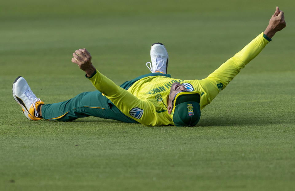 South Africa's Faf du Plessis reacts after taking a catch to dismiss Australia's Steven Smith for 29 runs during the 2nd T20 cricket match between South Africa and Australia at St George's Park in Port Elizabeth, South Africa, Sunday, Feb. 23, 2020. (AP Photo/Themba Hadebe)