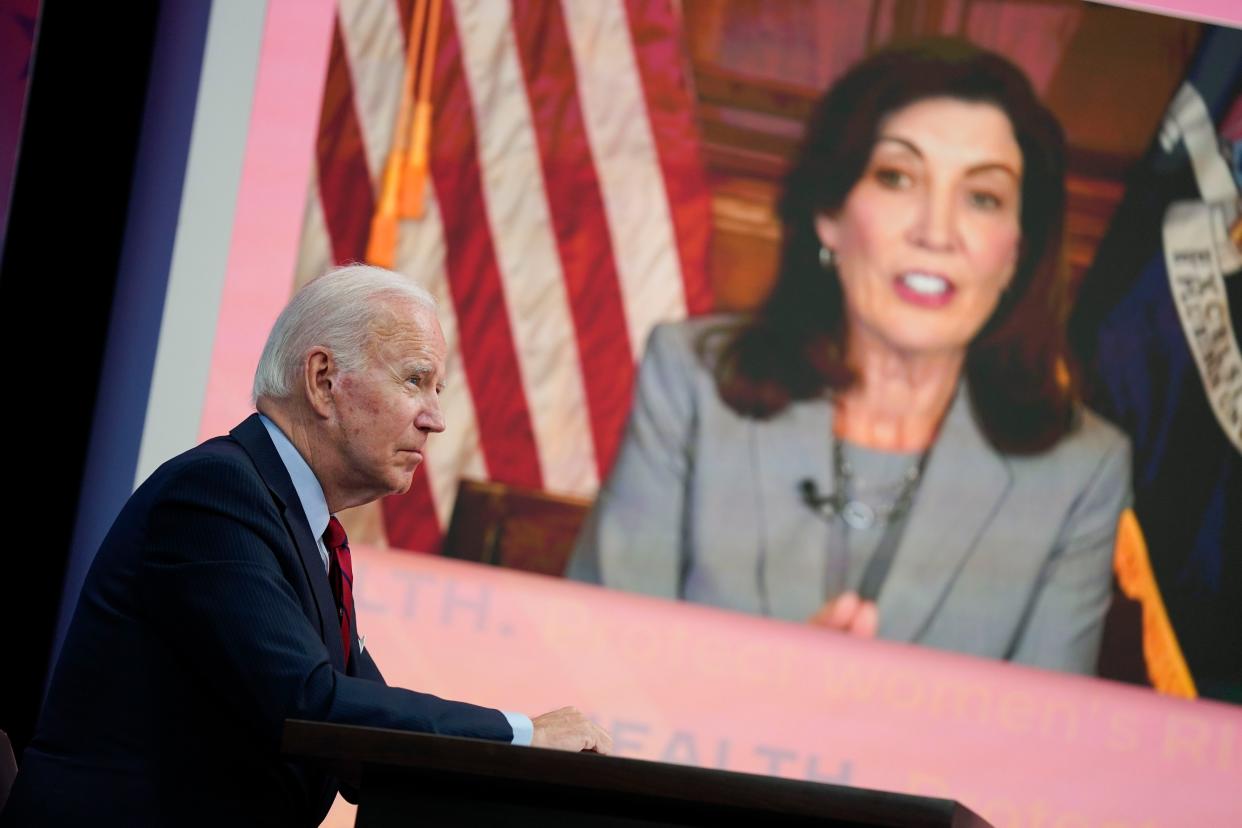 President Joe Biden listens as New York Gov. Kathy Hochul speaks during a virtual meeting with Democratic governors on the issue of abortion rights, in the South Court Auditorium on the White House campus, Friday, July 1, 2022, in Washington, D.C.