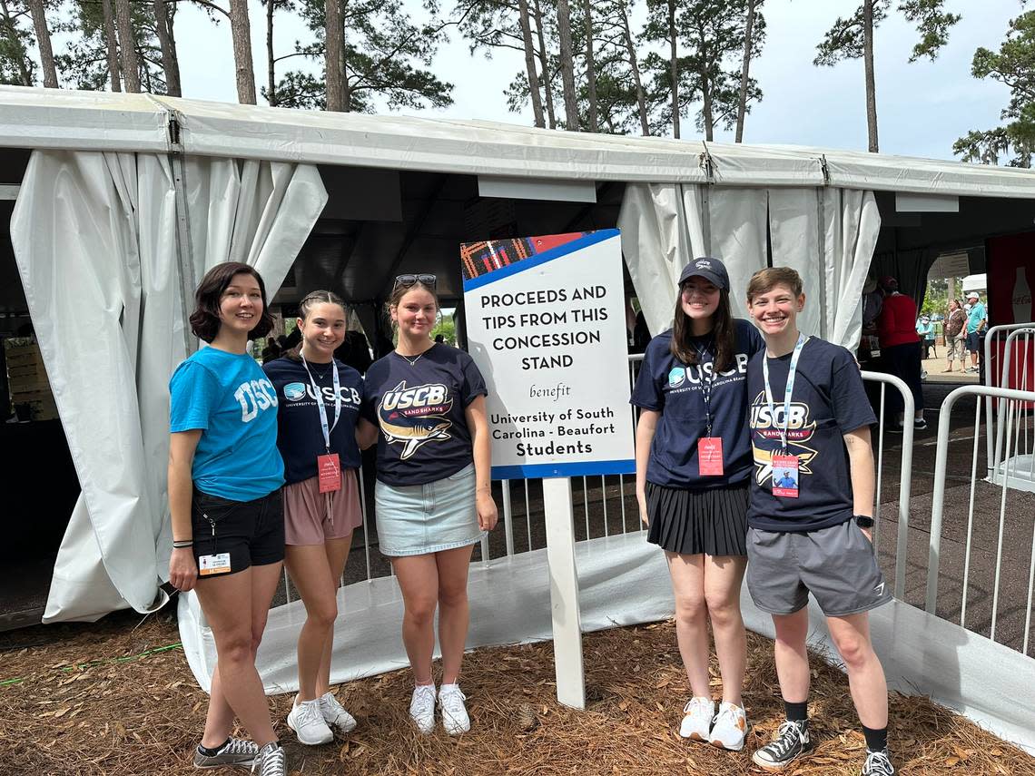 From left to right: USCB hospitality management students Rebecca Pollard, Maya Stovcsik, Riley Niemiec, Carly Rossi and Megan Rutan volunteered Wednesday at the Town of Hilton Head Island’s concession stand at RBC Heritage, one of the tournament’s most profitable food operations. Pollard says the program is vying for its own real estate at the annual event: “If we kill it this year, we’re hoping we can get our own concession stand.”