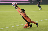 Montreal goalkeeper James Pantemis stops a shot during the first half of the team's MLS soccer match against Inter Miami, Wednesday, May 12, 2021, in Fort Lauderdale, Fla. (AP Photo/Lynne Sladky)