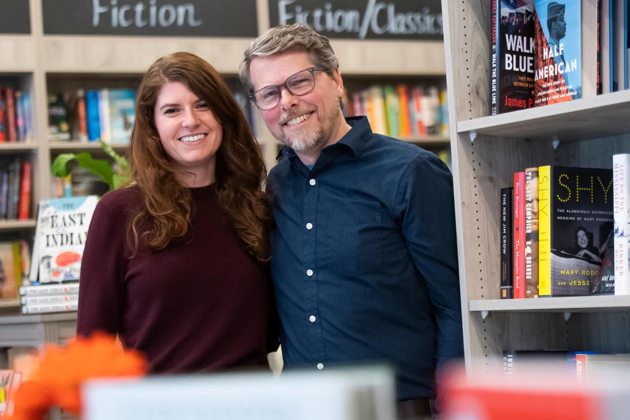 Sarah Timmcke and Chuck Blair pose for a photo inside their new shop, Bound Books, in downtown York City on May 2, 2023. In addition to offering thousands of book titles, Bound also a features a small café and a garden section full of houseplants.