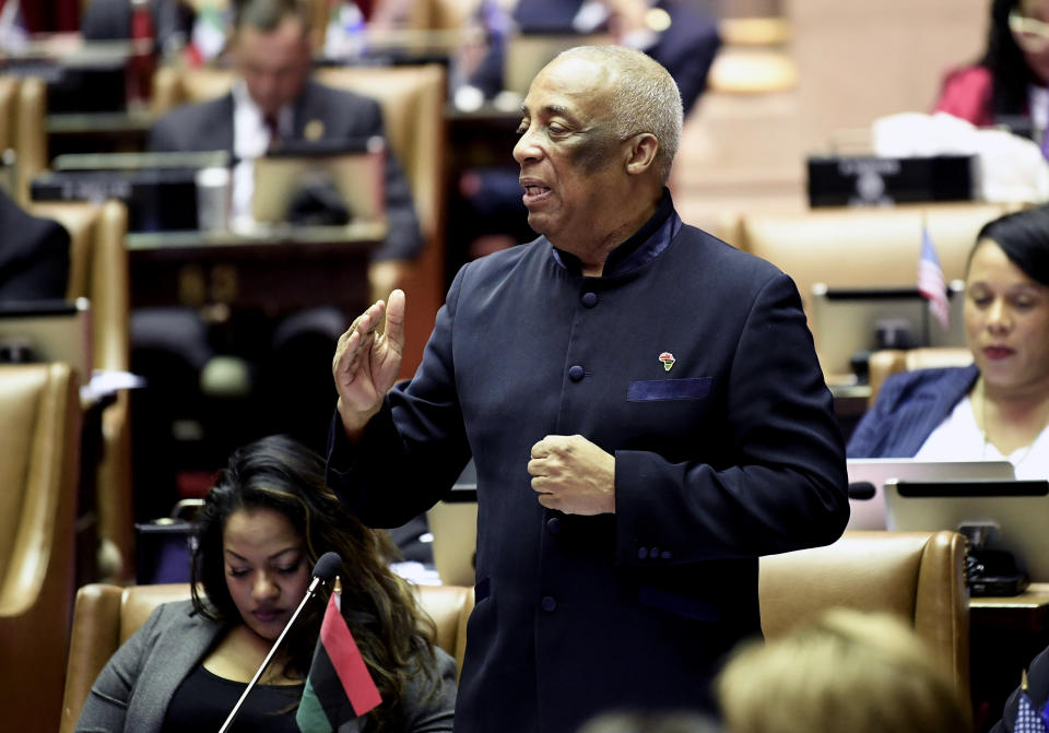 Assemblyman Charles Barron, D-Brooklyn, speaks as members of the Assembly debate budget bills in the Assembly Chamber at the state Capitol Sunday, March, 31, 2019, in Albany, N.Y. (AP Photo/Hans Pennink)