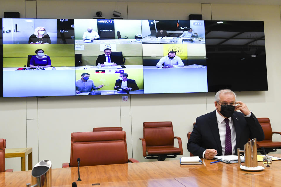 Australian Prime Minister Scott Morrison holds a national cabinet meeting with state and territory leaders, at Parliament House in Canberra, Thursday, December 30, 2021