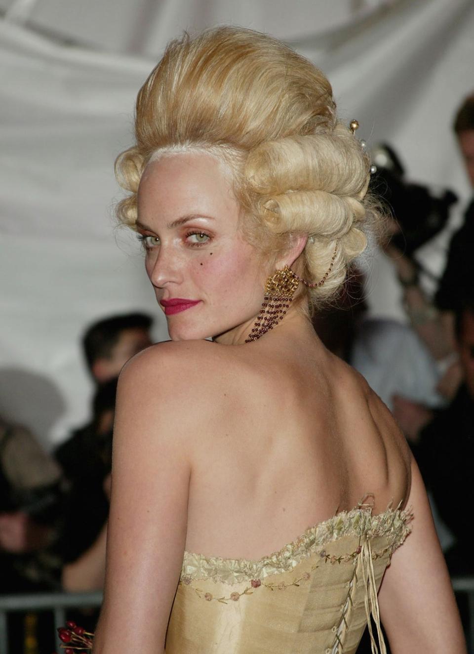 <p>Let Amber Valetta show you how it's done with her throwback 2004 Met Gala beauty look complete with regency coiff.</p>