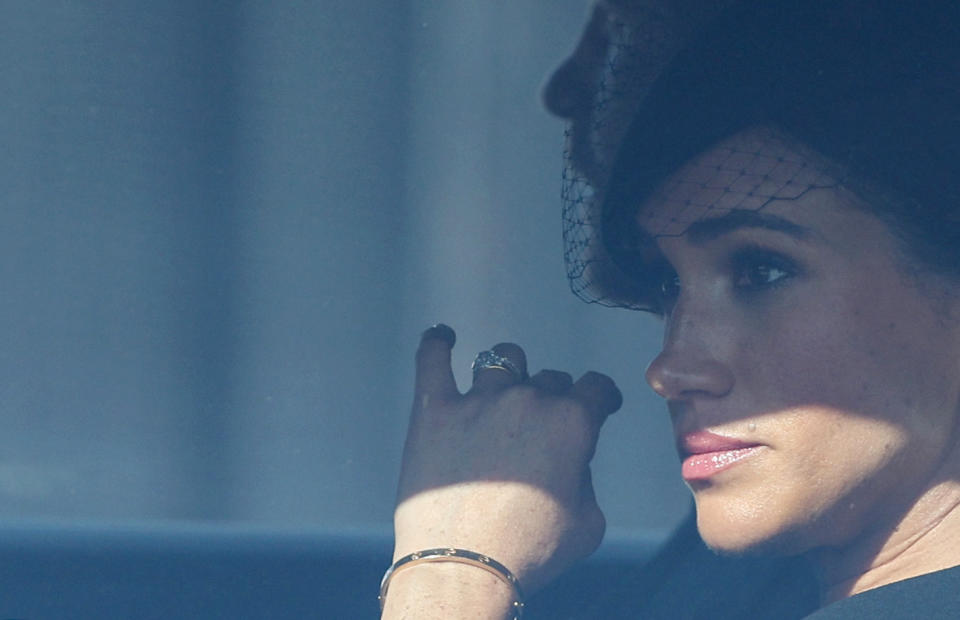 Britain's Prince Harry, Duke of Sussex and Meghan, Duchess of Sussex leave after a service for the reception of Queen Elizabeth II's coffin at Westminster Hall, in the Palace of Westminster in London on September 14, 2022, where the coffin of Queen Elizabeth II, will Lie in State. - Queen Elizabeth II will lie in state in Westminster Hall inside the Palace of Westminster, from Wednesday until a few hours before her funeral on Monday, with huge queues expected to file past her coffin to pay their respects. (Photo by Richard Heathcote / POOL / AFP) (Photo by RICHARD HEATHCOTE/POOL/AFP via Getty Images)