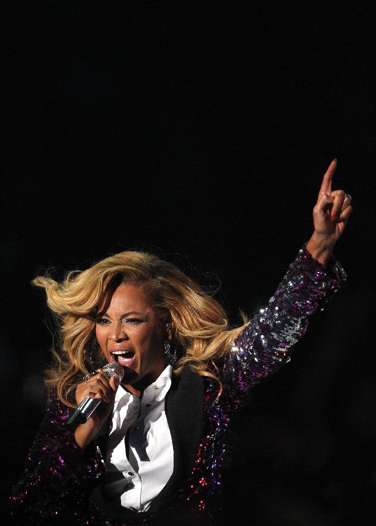 FILE - In this Aug. 28, 2011 file photo, Beyonce performs at the MTV Video Music Awards, in Los Angeles. Kelly Clarkson and fun. are just two of the acts who will perform during the upcoming inaugural festivities, which also includes Beyonce, James Taylor, Stevie Wonder, Katy Perry and dozens of others. (AP Photo/Matt Sayles, File)