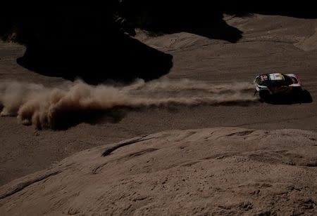 Dakar Rally - 2017 Paraguay-Bolivia-Argentina Dakar rally - 39th Dakar Edition - Tenth stage from Chilecito to San Juan, Argentina 12/01/17. Stephane Peterhansel of France drives his Peugeot with his copilot Jean Paul Ottret. REUTERS/Ricardo Moraes