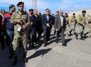 Fayez Mustafa al-Sarraj, Libya's internationally recognized Prime Minister, visits Tripoli port after an attack