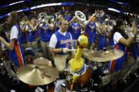 The Florida pep band plays before the first half in a regional semifinal game against UCLA at the NCAA college basketball tournament, Thursday, March 27, 2014, in Memphis, Tenn. (AP Photo/John Bazemore)