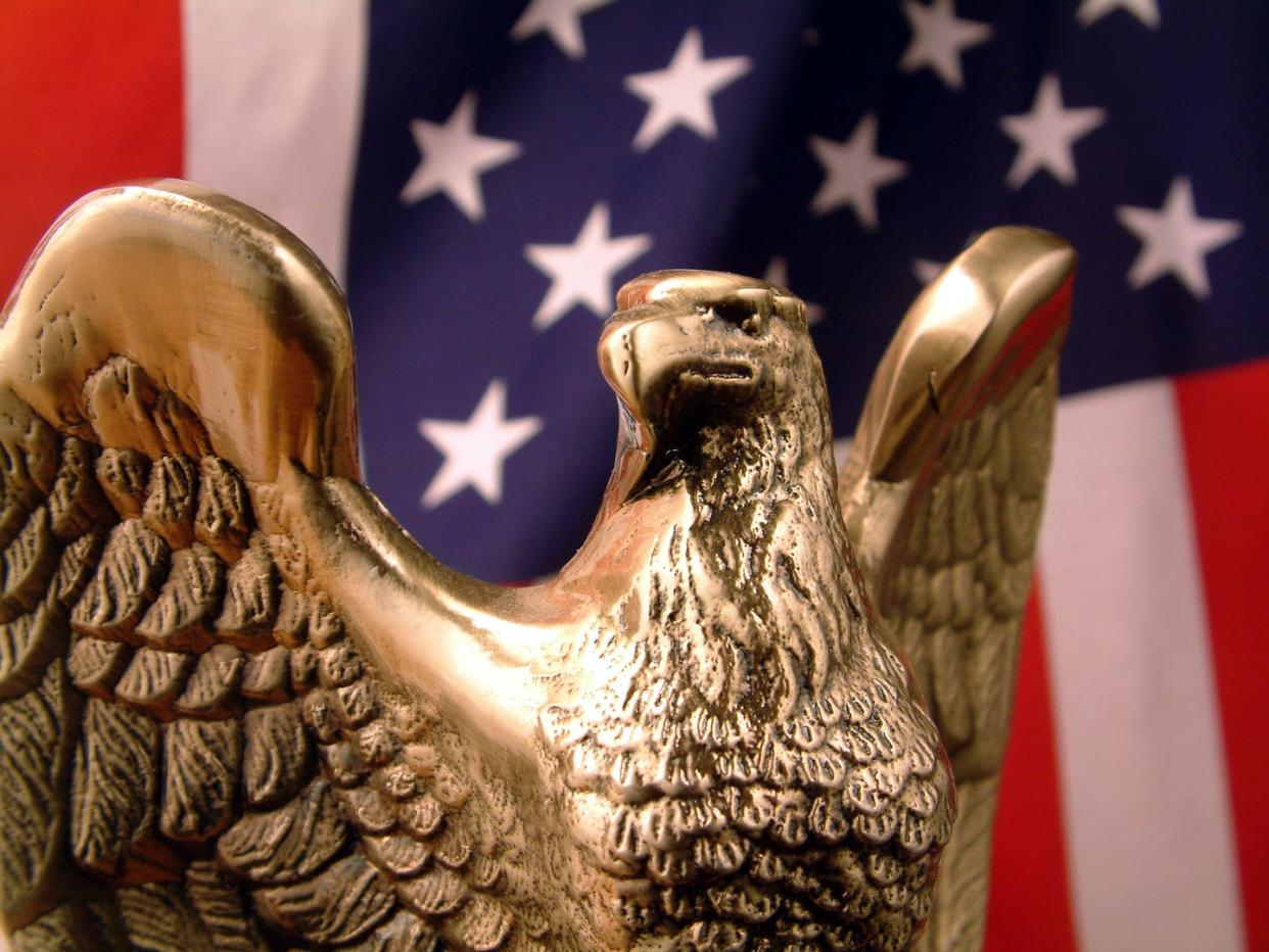 <span class="caption">How did the U.S. political system get the way it did?</span> <span class="attribution"><a class="link " href="https://www.gettyimages.com/detail/photo/bronze-eagle-with-flag-royalty-free-image/172183035" rel="nofollow noopener" target="_blank" data-ylk="slk:jsmith/iStock/Getty Images Plus;elm:context_link;itc:0;sec:content-canvas">jsmith/iStock/Getty Images Plus</a></span>