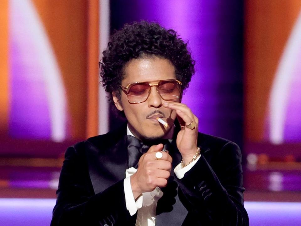 Bruno Mars of Silk Sonic accepts the Record Of The Year award for ‘Leave The Door Open’ onstage during the 64th Annual GRAMMY Awards at MGM Grand Garden Arena on April 03, 2022 in Las Vegas, Nevada. (Photo by Rich Fury/Getty Images for The Recording Academy) (Getty Images for The Recording Academy)