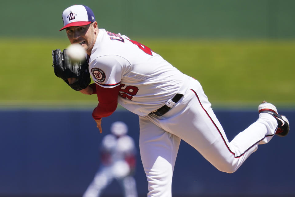 Washington Nationals' Patrick Corbin (46) pitches in the first inning of a spring training baseball game against the Miami Marlins, Monday, March 28, 2022, in West Palm Beach, Fla. (AP Photo/Sue Ogrocki)