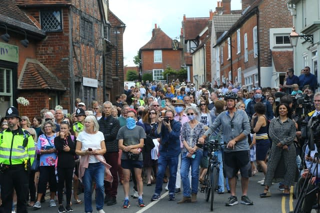 Members of the public crowded into the streets to pay their respects 