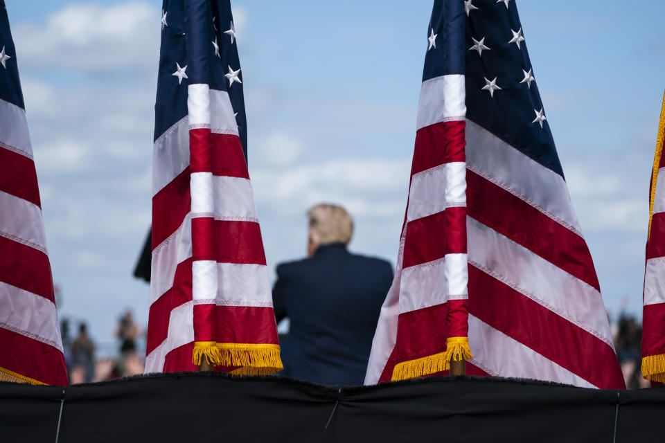 President Donald Trump speaks during a campaign rally at Pitt-Greenville Airport, Thursday, Oct. 15, 2020, in Greenville, N.C. (AP Photo/Evan Vucci)