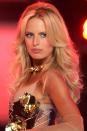 <p>Karolina Kurkova adds tons of volume at the crown in 2006.</p>