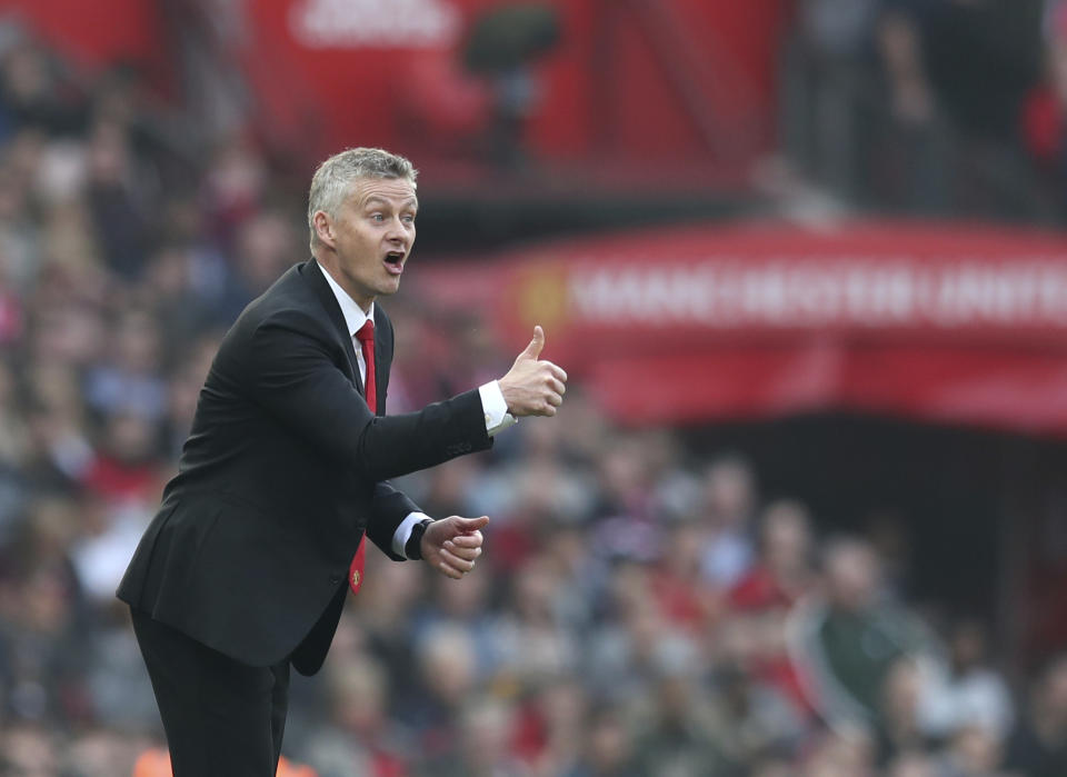 Manchester United manager Ole Gunnar Solskjaer reacts during the English Premier League soccer match between Manchester United and Liverpool at Old Trafford stadium in Manchester, England, Sunday, Feb. 24, 2019. (AP Photo/Jon Super)