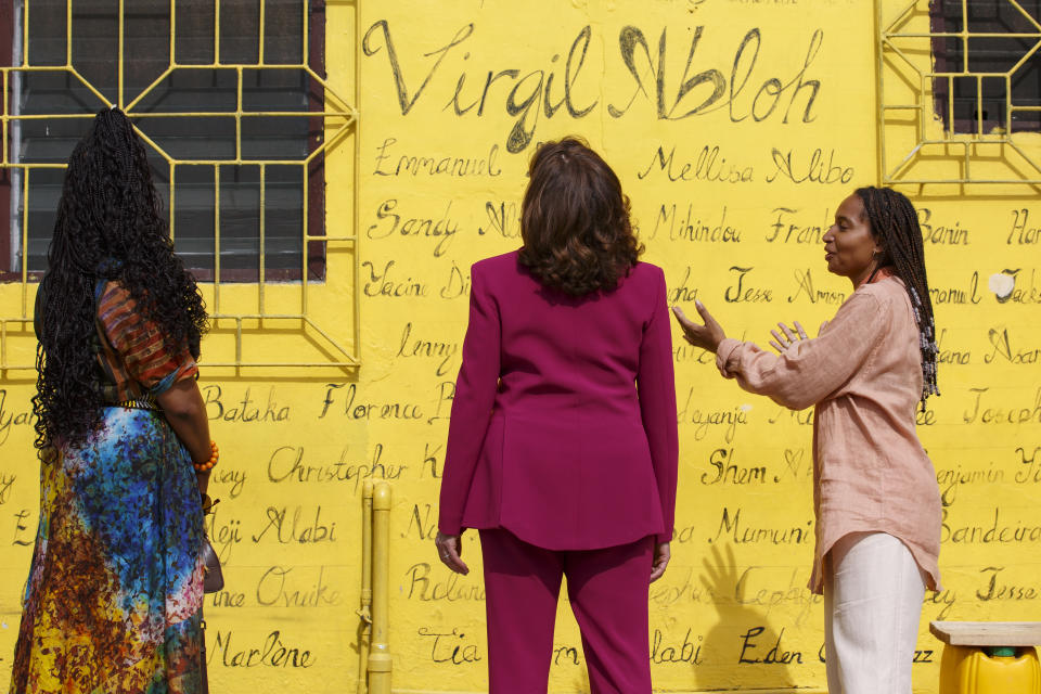 U.S. Vice President Kamala Harris, centre, flanked by Vibration studio at the freedom skate park founder Sandy Alibo, right and actress Sheryl Lee Ralph look at a mural, in Accra, Ghana, Monday March 27, 2023. Vibration studios is a work station for young creative artists that includes a community recording studio and music business program. Harris is on a seven-day African visit that will also take her to Tanzania and Zambia. (AP Photo/Misper Apawu)