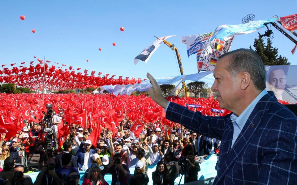 Turkey's President Recep Tayyip Erdogan addresses his supporters in Antalya - Credit: Pool Presidential Press Service/AP