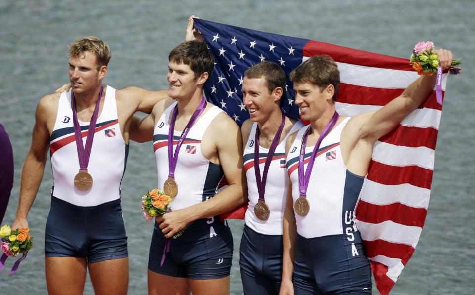 Pittsford’s Henrik Rummel, second from left, won a bronze medal in rowing at the 2012 Summer Olympics in London.