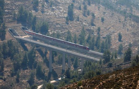 A view shows a new Israeli high-speed rail service that connects Ben Gurion airport with Jerusalem as seen from the the occupied West Bank September 25, 2018. REUTERS/Mohamad Torokman