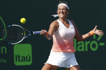 Victoria Azarenka hits a forehand against Silvia Soler-Espinosa (not pictured) on day two of the Miami Open at Crandon Park Tennis Center. Azarenka won 6-1, 6-3. Mandatory Credit: Geoff Burke-USA TODAY Sports