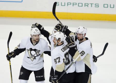 May 24, 2016; Tampa, FL, USA; The Pittsburgh Penguins celebrate a goal against the Tampa Bay Lightning during the second period in game six of the Eastern Conference Final of the 2016 Stanley Cup Playoffs at Amalie Arena. Mandatory Credit: Reinhold Matay-USA TODAY Sports