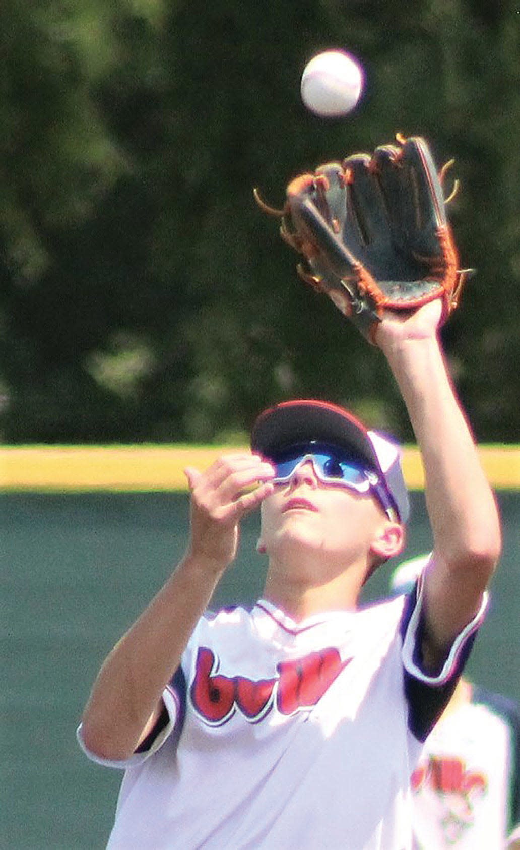 Bartlesville Doenges Ford Indians second baseman Kael Siemers snares a pop fly during last year's fifth-place contest at the Winget tourney at Doenges Stadium. This year's Winget tourney begins Friday and lasts through July Fourth.