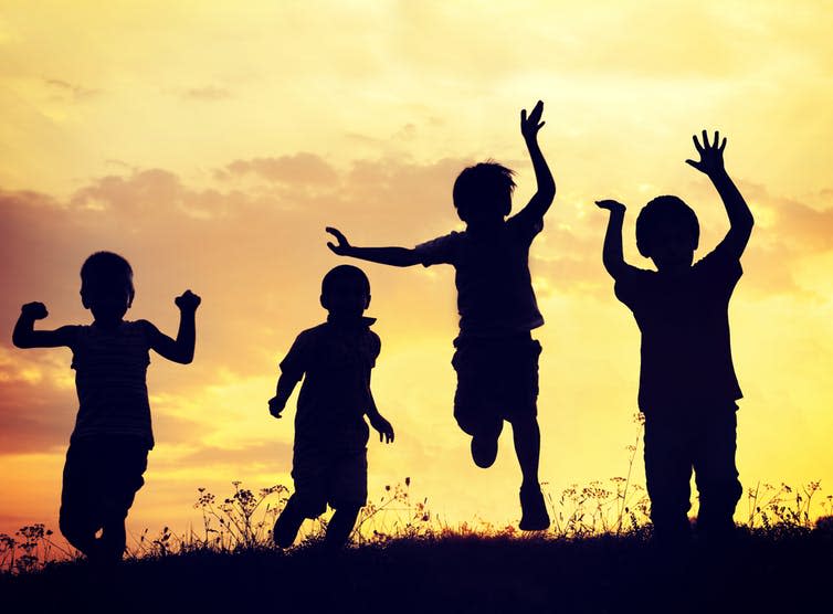 <span class="caption">Planning with children in mind can help fulfil other goals such as biodeversity and green space for all.</span> <span class="attribution"><a class="link " href="https://www.shutterstock.com/image-photo/children-playing-on-summer-sunset-meadow-205995295" rel="nofollow noopener" target="_blank" data-ylk="slk:Shutterstock;elm:context_link;itc:0;sec:content-canvas">Shutterstock</a></span>