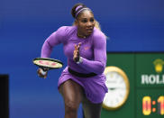 Serena Williams, of the United States, dashes to the net on a return to Petra Martic, of Croatia, during round four of the US Open tennis championships Sunday, Sept. 1, 2019, in New York. (AP Photo/Sarah Stier)