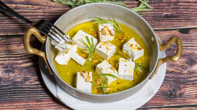 blocks of marinated feta in oil