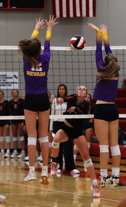 Roland-Story outside hitter Grace Dowling goes for a kill during the Norse's Heart of Iowa Conference loss to No. 11 (Class 3A) Nevada Sept. 15 in Story City.