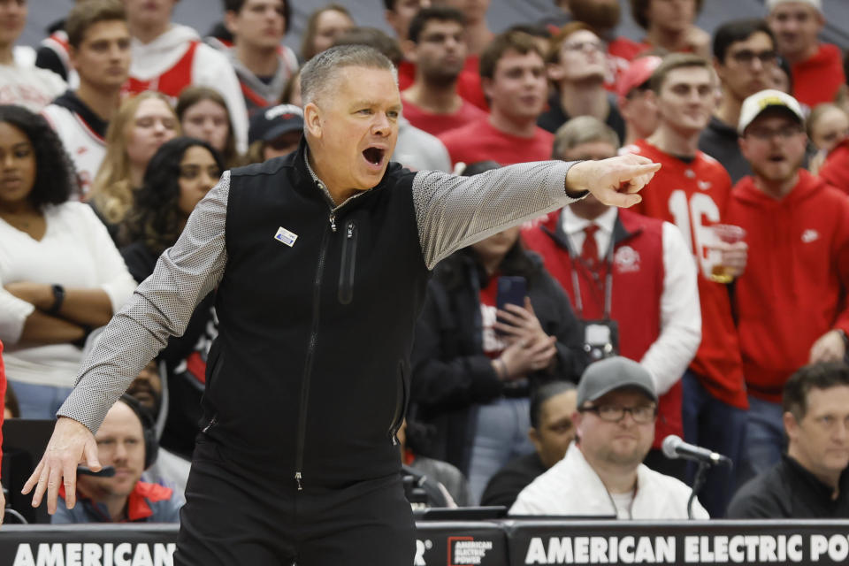 Ohio State head coach Chris Holtmann shouts to his team during the second half of an NCAA college basketball game against Iowa on Saturday, Jan. 21, 2023, in Columbus, Ohio. (AP Photo/Jay LaPrete)