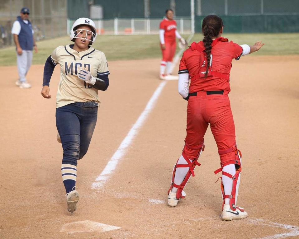 Samantha Rodriguez scores the second run as Mission Prep won 2-0 over Kerman in a softball playoff May 22, 2024.