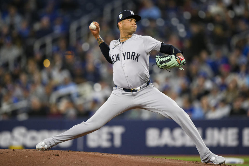 New York Yankees pitcher Luis Gil delivers during the first inning of a baseball game against the Toronto Blue Jays in Toronto on Monday, April 15, 2024. (Christopher Katsarov/The Canadian Press via AP)