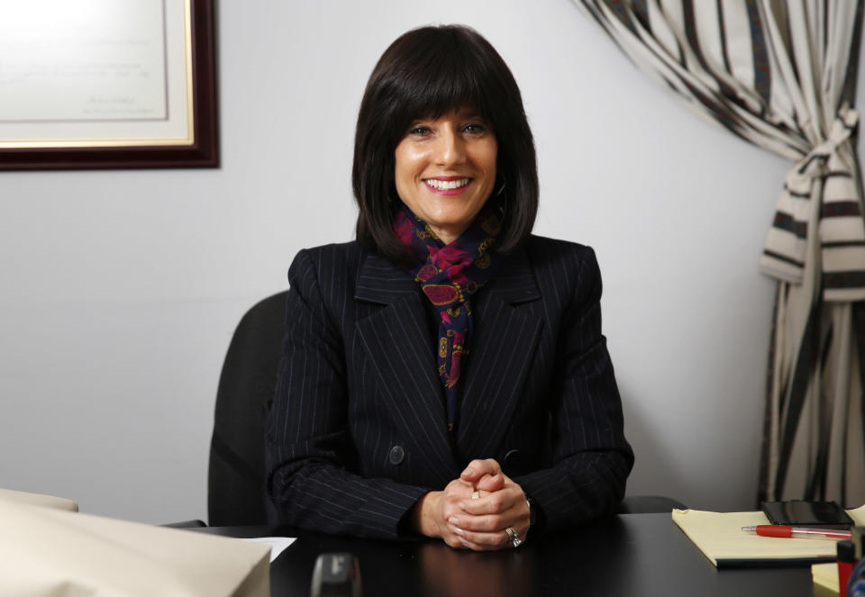 In this Thursday, Dec. 29, 2016 photo, Rachel Freier poses for a picture at her law office in the Borough Park section of Brooklyn, N.Y. In some ways, Freier has an ordinary background for a newly elected civil court judge: She's a real estate and commercial lawyer who volunteers in family court and in her community, where she even serves as a paramedic. But then there's all the extraordinary about Freier, who starts work in a Brooklyn courthouse Tuesday, Jan. 3, 2017, as apparently the first woman from Judaism's ultra-Orthodox Hasidic community to be elected as a judge in the United States. (AP Photo/Seth Wenig)