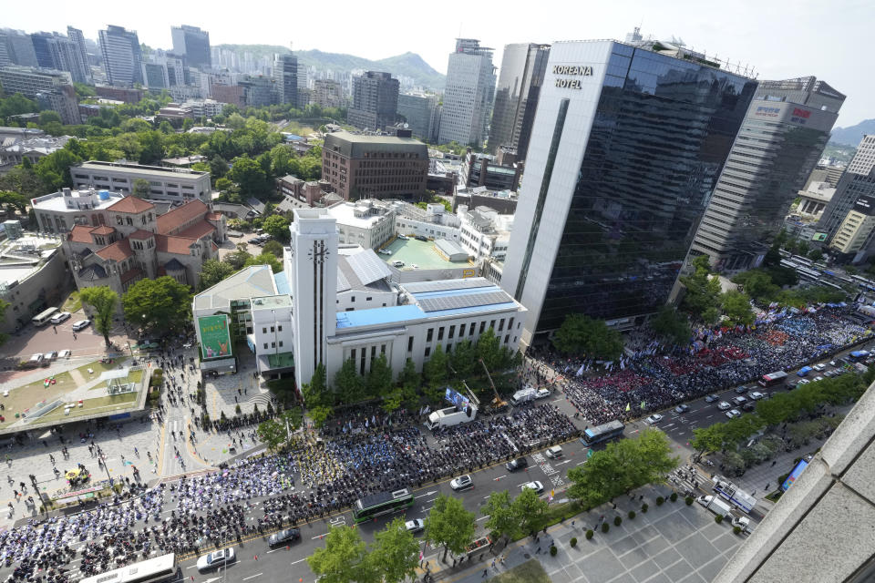 Members of the Korean Confederation of Trade Unions gather to attend a rally on May Day in Seoul, South Korea, Wednesday, May 1, 2024. Workers, activists and others in Asian capitals took to the streets on Wednesday to mark May Day with protests over rising prices and governments' labor polices and calls for greater labor rights. (AP Photo/Ahn Young-joon)