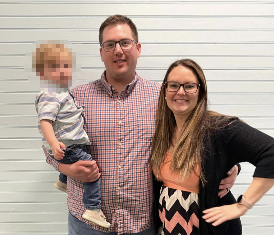 Amber and Timothy Hicks, 31, are pictured with their son, 2.