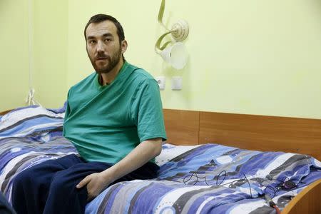 A man, according to Ukraine's state security service (SBU) is named Yevgeny Yerofeyev and is one of two Russian servicemen recently detained by Ukrainian forces, speaks during an interview with Reuters at a hospital in Kiev, Ukraine, May 28, 2015. REUTERS/Valentyn Ogirenko