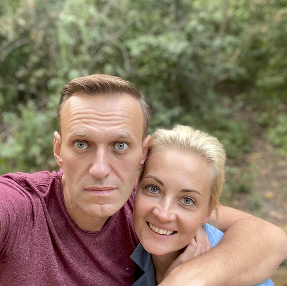 In this photo published by Russian opposition leader Alexei Navalny on his instagram account on Friday, Sept. 25, 2020, Russian opposition leader Alexei Navalny and his wife Yulia pose for a selfie in an unknown location in Germany. This week Navalny was discharged from a Berlin hospital after being treated for what German authorities determined to be nerve agent poisoning. In an Instagram post on Friday, the politician thanked Russian pilots for landing the plane after he collapsed into a coma on Aug. 20 and medics at the Omsk airport injecting him with atropine, saying they gave him "additional 15-20 hours of life." (Navalny Instagram via AP)