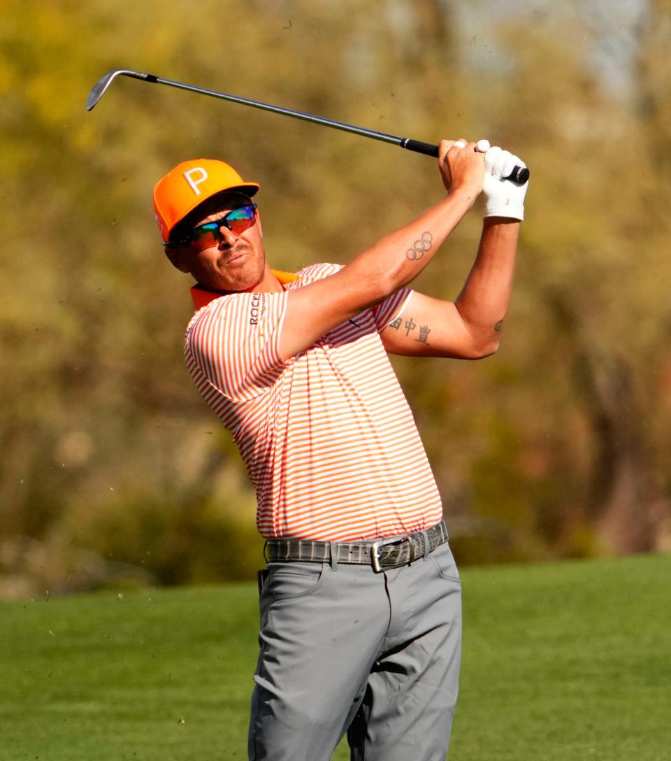 Rickie Fowler plays his second shot on the second hole during the final round of the WM Phoenix Open at TPC Scottsdale on Feb. 12, 2023.