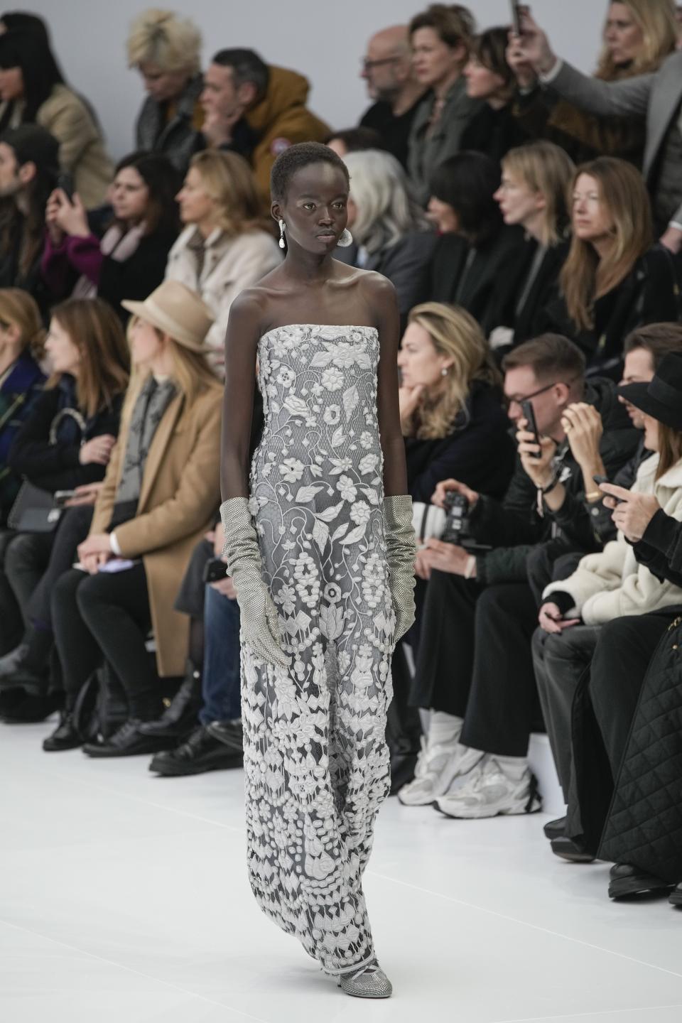 A model wears a creation as part of the Fendi Haute Couture Spring-Summer 2023 collection presented in Paris, Thursday, Jan. 26, 2023. (AP Photo/Christophe Ena)