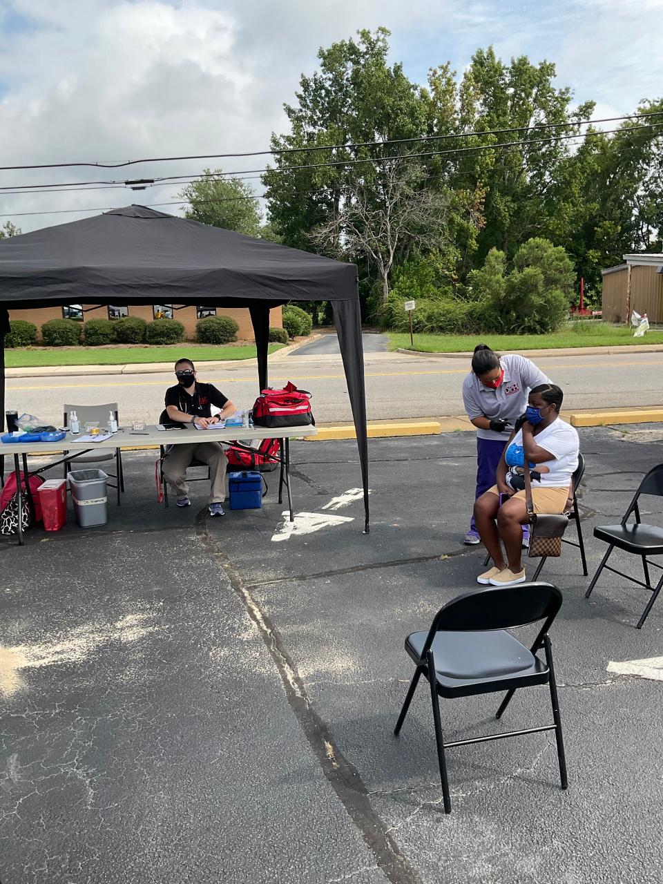 Organizers with the "Keep the Faith, Get Vaccinated'' in Georgia invited county health officials to join them at a back-to-school event in Wrens, Ga., Aug. 7, 2021 to administer COVID-19 vaccines.