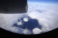 An aerial view looking down near the Alexandra Land island of the Franz Josef Land archipelago, Russia, Monday, May 17, 2021. Once a desolate home mostly to polar bears, Russia's northernmost military outpost is bristling with missiles and radar and its extended runway can handle all types of aircraft, including nuclear-capable strategic bombers, projecting Moscow's power and influence across the Arctic amid intensifying international competition for the region's vast resources. (AP Photo/Alexander Zemlianichenko)