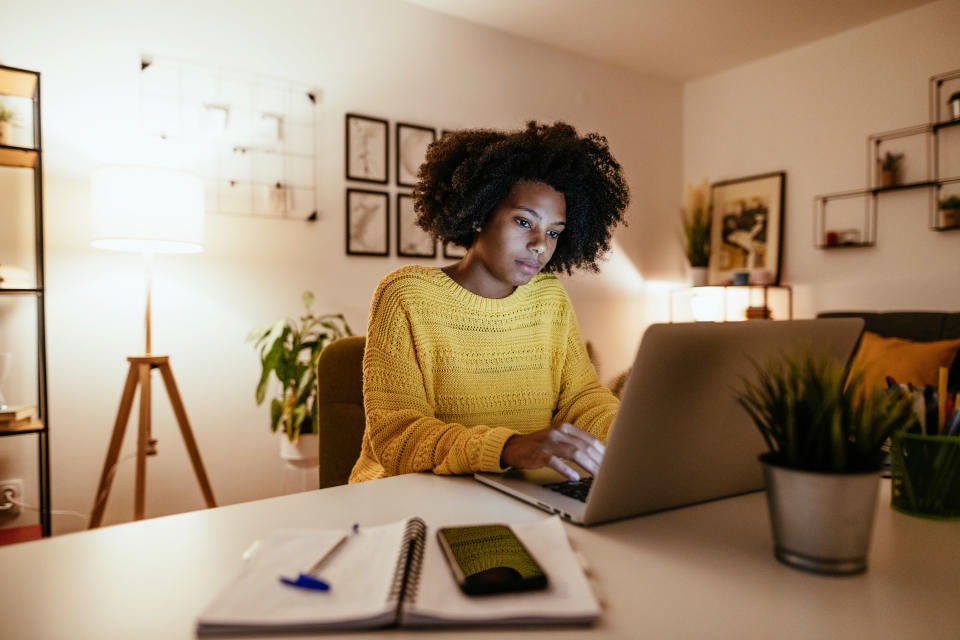 Woman on her computer typing