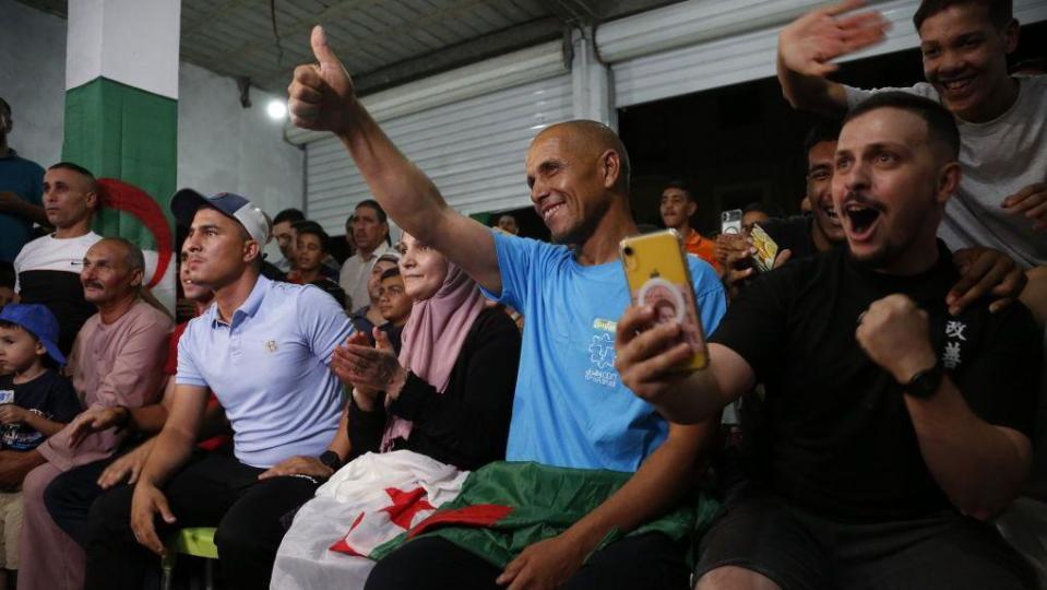 An image of people in  Imane Khelif's village Biban Mesbah celebrating her victory in the women's 66kg semi-final boxing match at the Olympics in Paris - Tuesday 6 August 2024