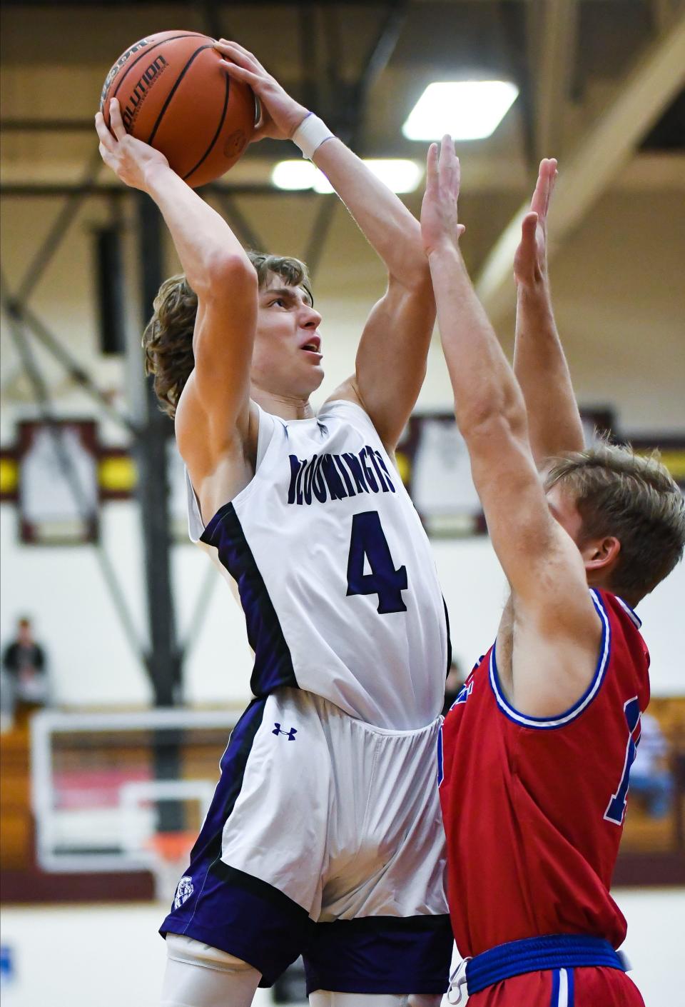 Bloomington South’s Alex Shaevitz (4) attempts a shot over Martinsville’s Rhys Wolf (10) during their IHSAA boys’ basketball sectional semifinal game at Bloomington North on Friday, March 1, 2024.